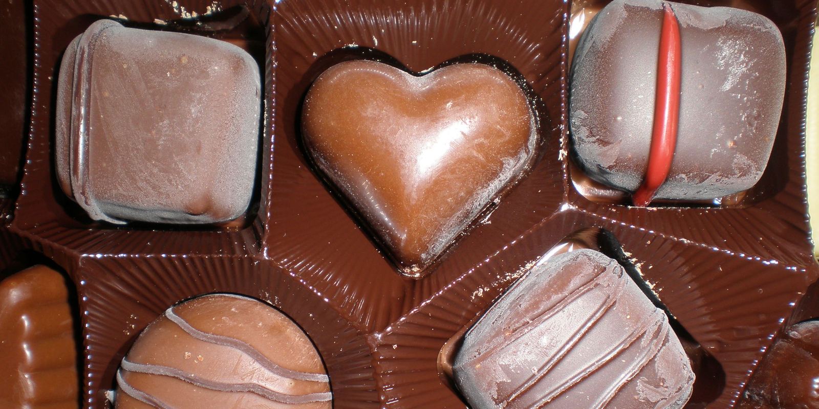 An assortment of decorated Belgian filled chocolates