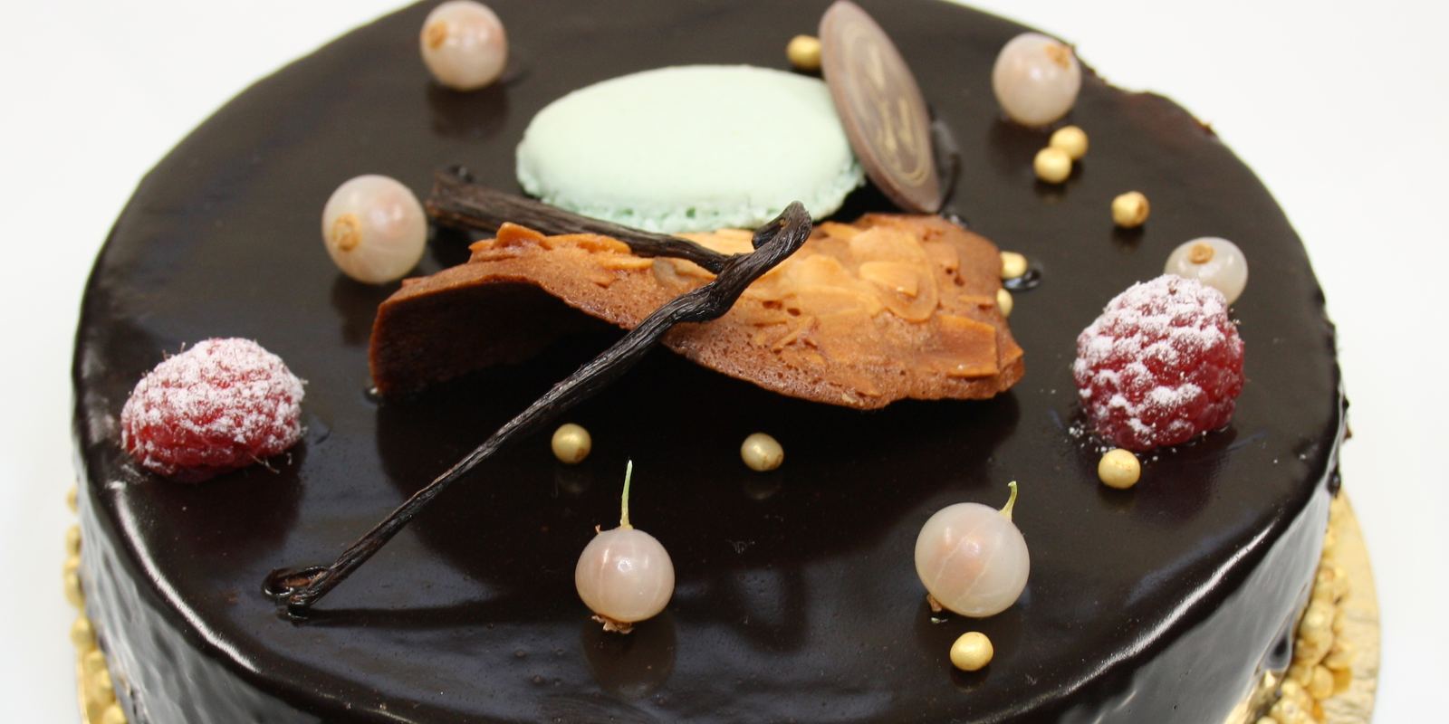 A slice of dark chocolate mousse cake on a plate